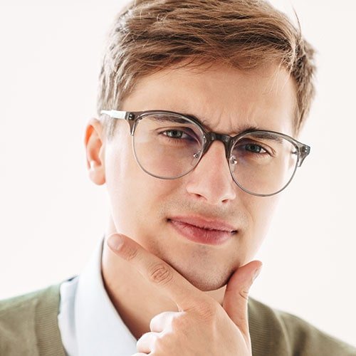 thoughtful young guy student in eyeglasses 4fg5usn min.jpg